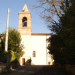 Lapide in marmo collocata sul muro del campanile della chiesa di Pilonico Materno